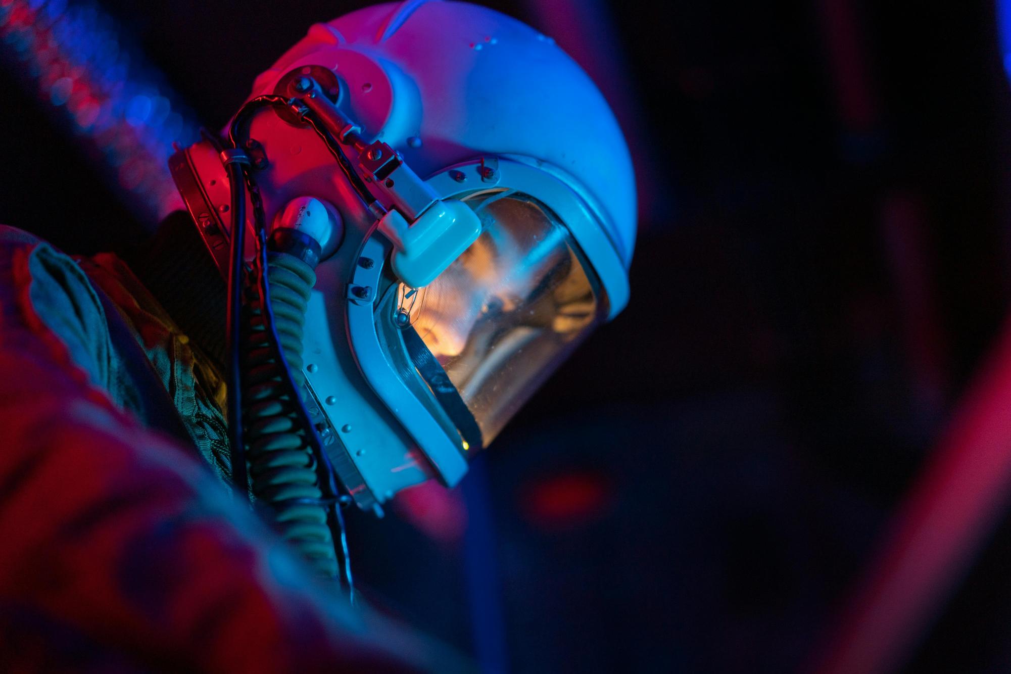 Photo by Mikhail Nilov: https://www.pexels.com/photo/woman-in-a-spacesuit-with-blue-helmet-7672255/ 
